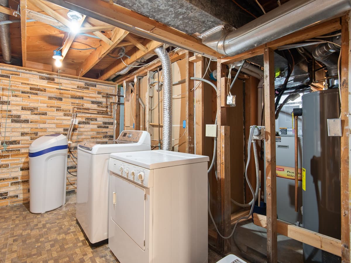 New gas water heater with expansion tank and drain pan