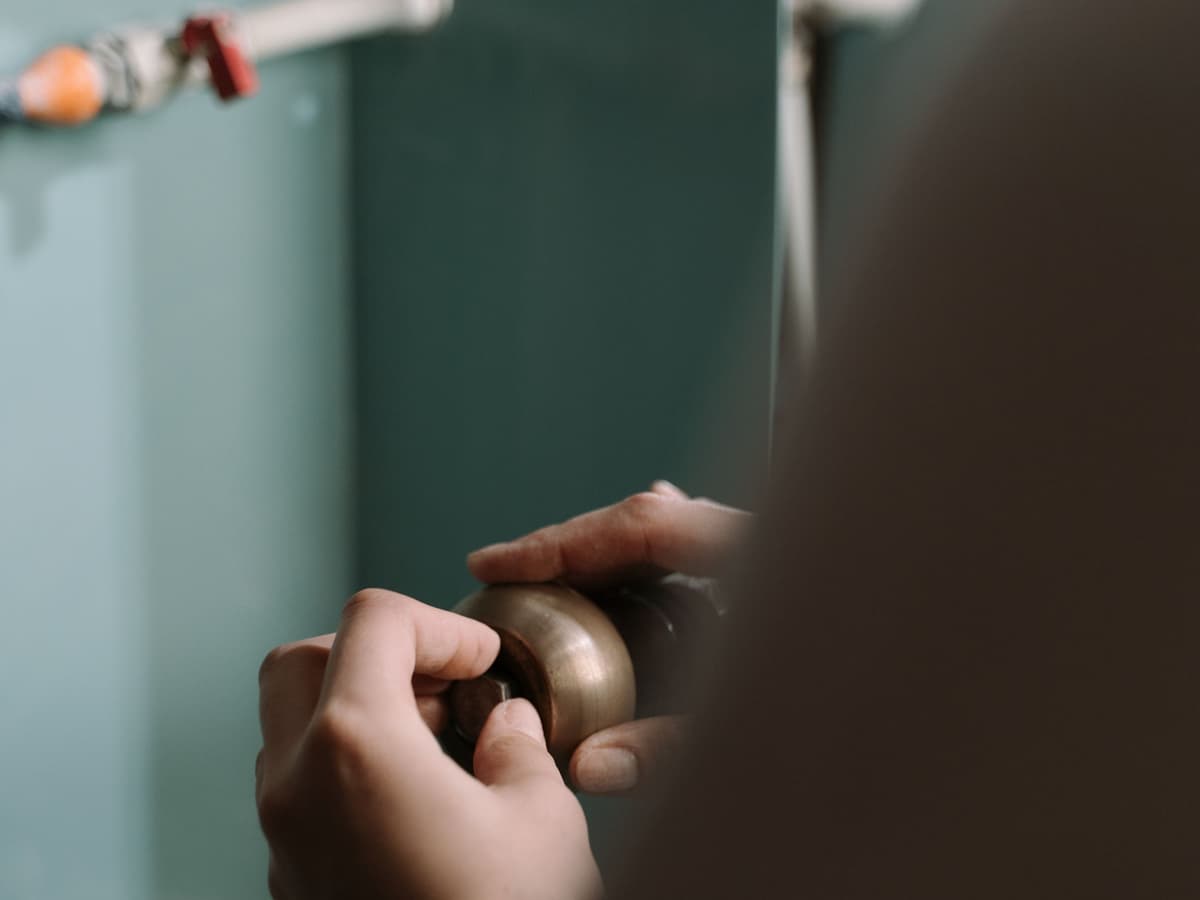 Tankless water heater being descaled with a flush kit